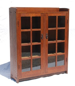 Original Gustav Stickley two door oak bookcase, signed.  1907 - 1912